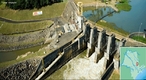 Barragem Pequena Central Hidreltrica Mogi-Guau. Em operao desde 1999.</br> Localizao: Rio Mogi-Guau. Reservatrio: rea de 5,73 km e volume de 32,89 x 106 m.</br>Barragem: tipo Aterro compactado, comprimento: 150 m.</br>Turbina: Kaplan Tubular S, queda bruta de 11,6 m. Gerador: tipo Sincrono de eixo horizontal e potncia total de 2 x 3,6 = 7,2 MW.</br> Vertedouro: Comporta de superfcie e descarga total de 4 x 524,8 = 2.099 m/s.</br> No tem eclusa.  </br></br>  Palavras-chave: Dimenso Socioambiental. Econmica. Demogrfica. Territrio. Lugar. Regio. usina, barragem, Mogi Guau, So Paulo, energia Eltrica. Hidreltrica.